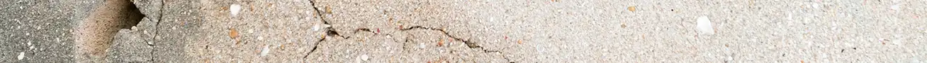 Surface cracks in concrete caused by freeze-thaw cycles and internal pressure