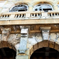 What causes the destruction of historical buildings?