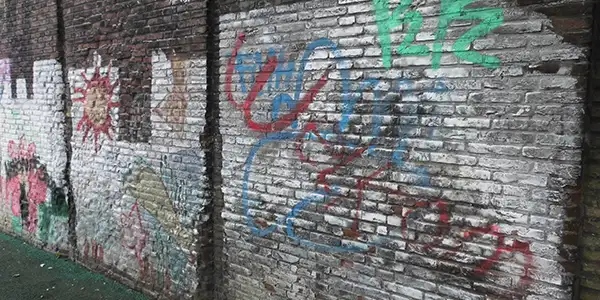 restored stone wall after removing graffiti with Logic Clean BT